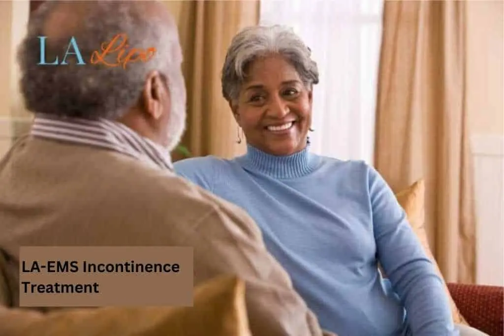 Couple sat smiling at each other - LA-EMS treatment Hendon