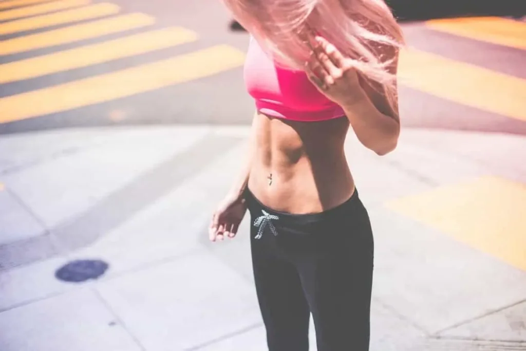 Woman with toned stomach after LA-EMS Body Sculpting Treatment Hendon
